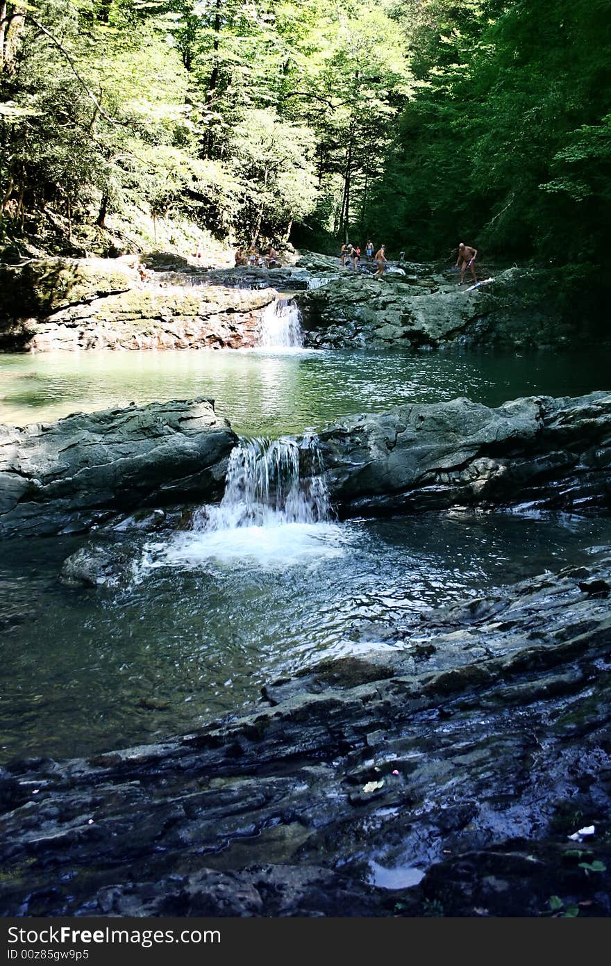 Mountain river in encirclement granite declivity