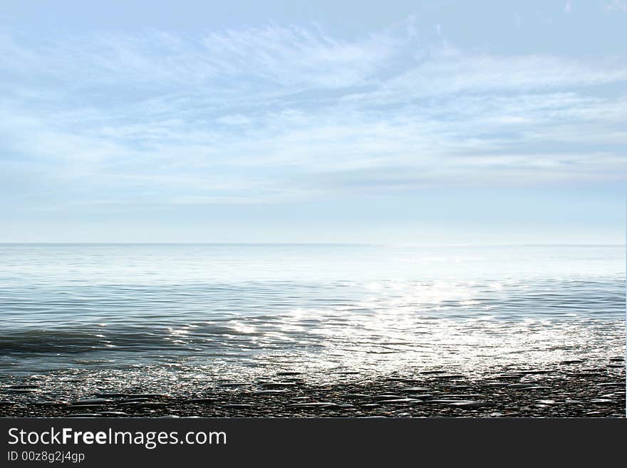 Wave on sea beach under year blue sky and cloud