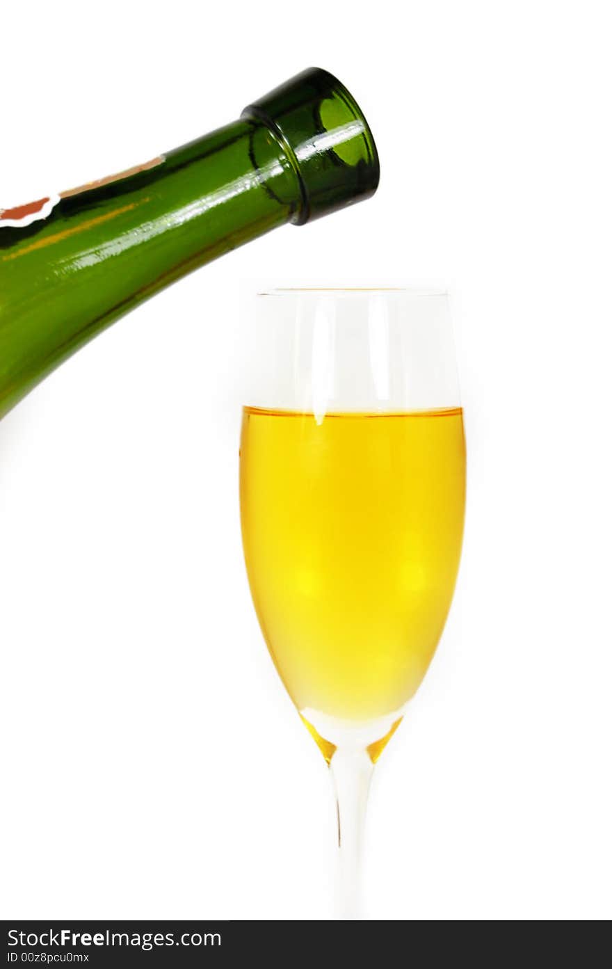 Pouring some white wine in glass, isolated on white. Pouring some white wine in glass, isolated on white