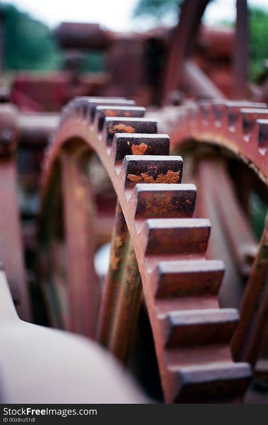 Gears on an International Harvester. A piece of old farm equipment, unused in years.