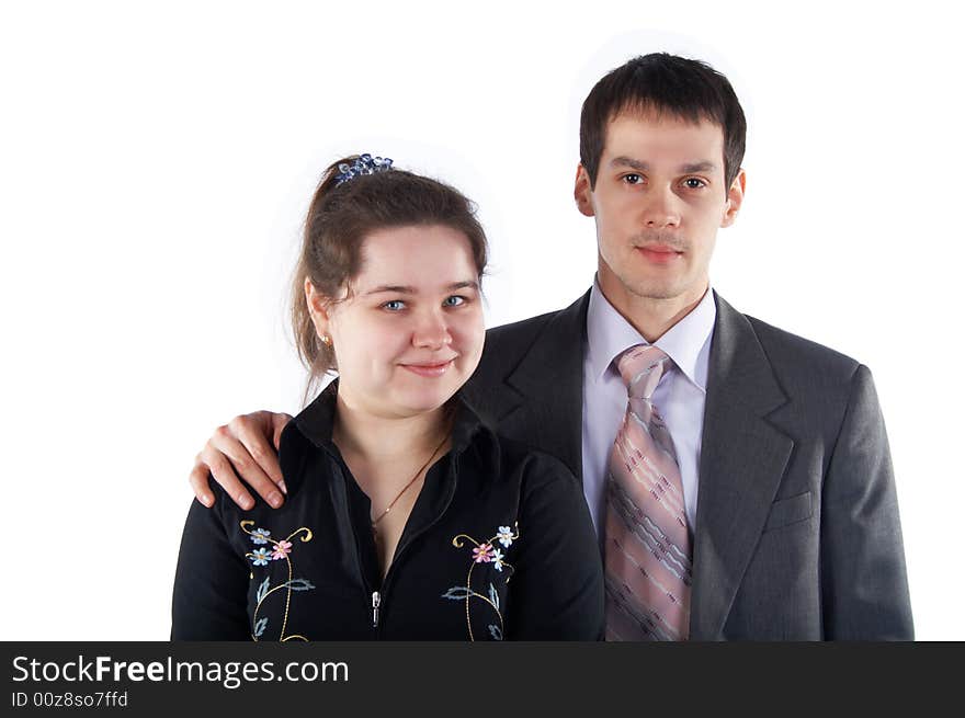 Girl with young man in suit isolated on white