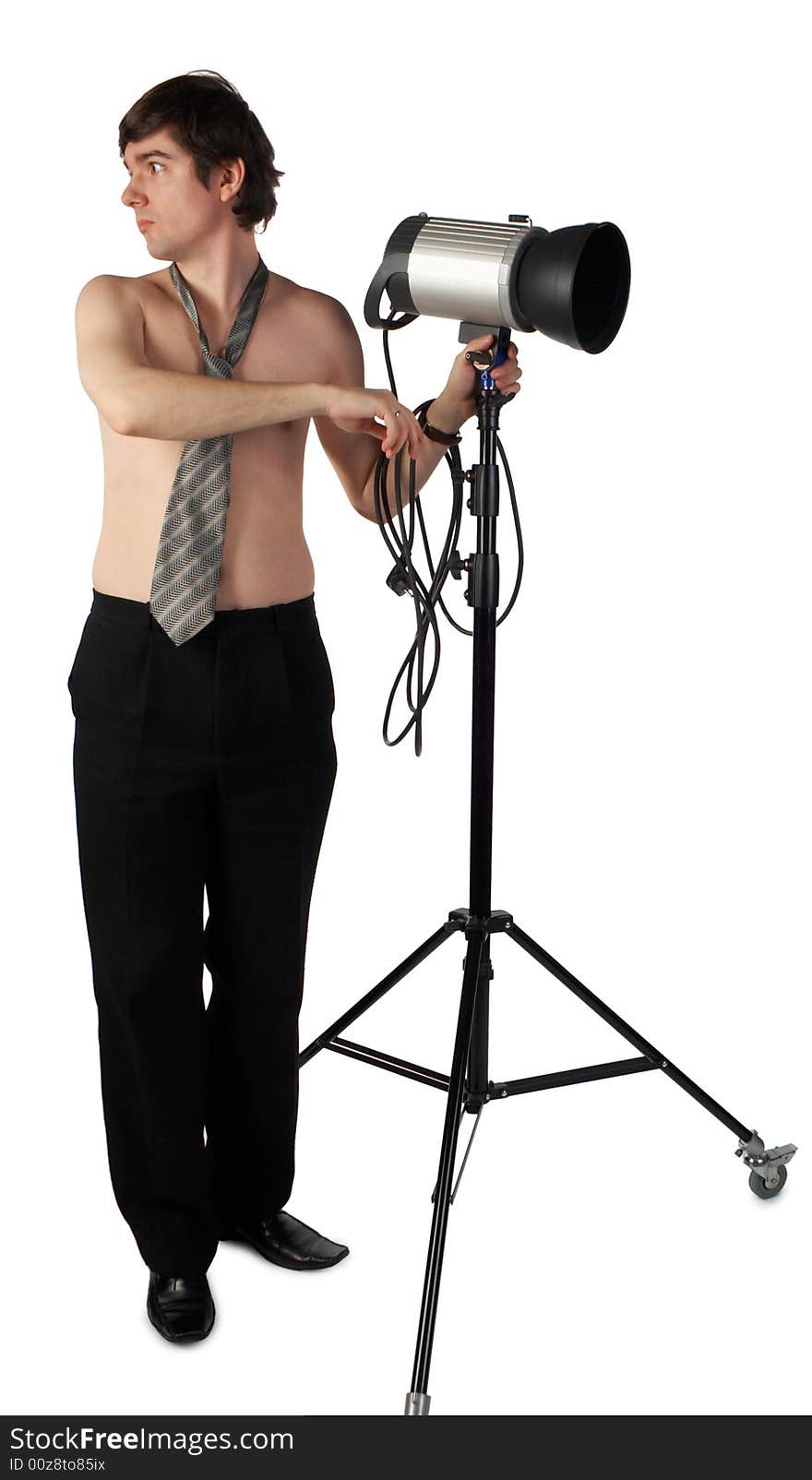 Young man working with a lighter isolated on white