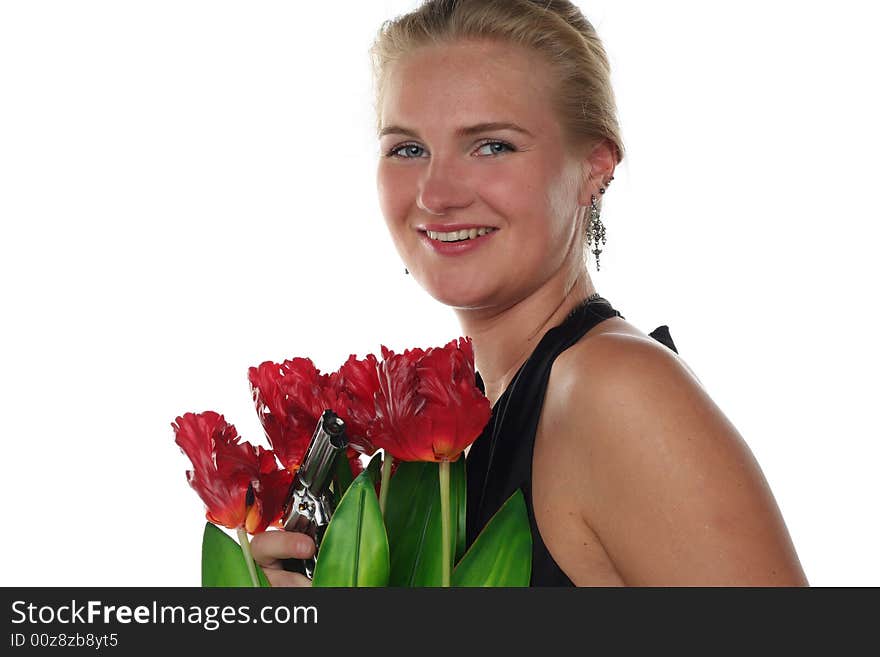 Woman with tulips and revolver isolated on white background