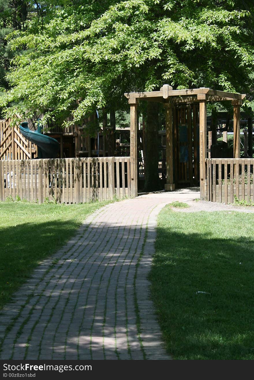 The entrance to a public playground at the park. The entrance to a public playground at the park