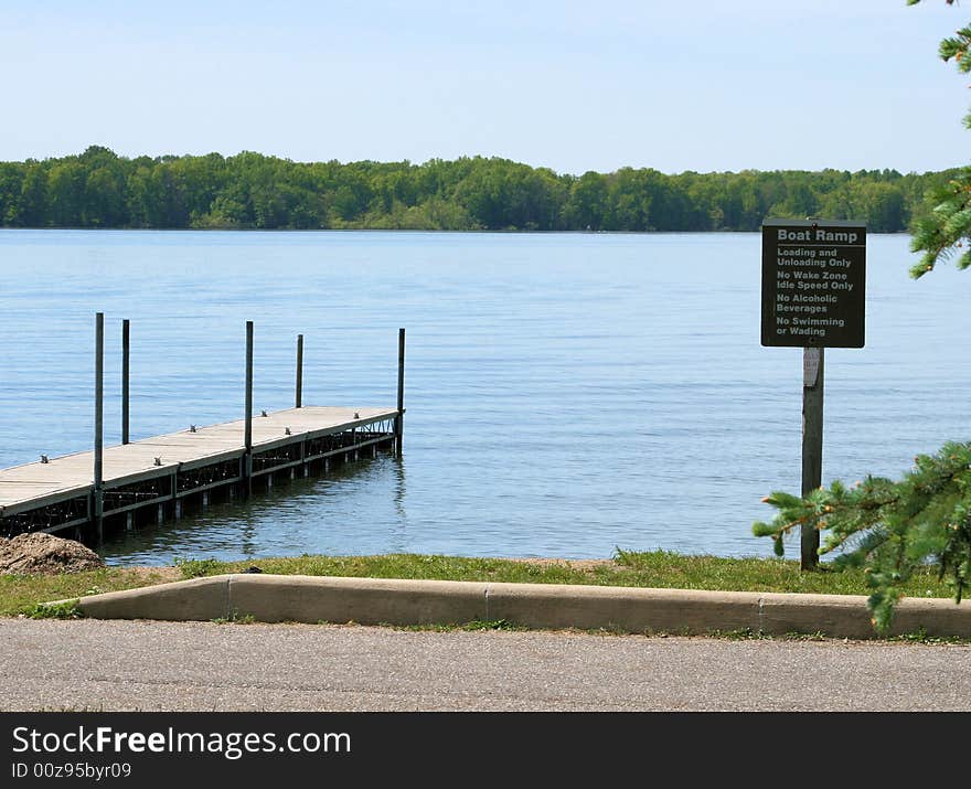 Boat Dock And Sign At The Lake