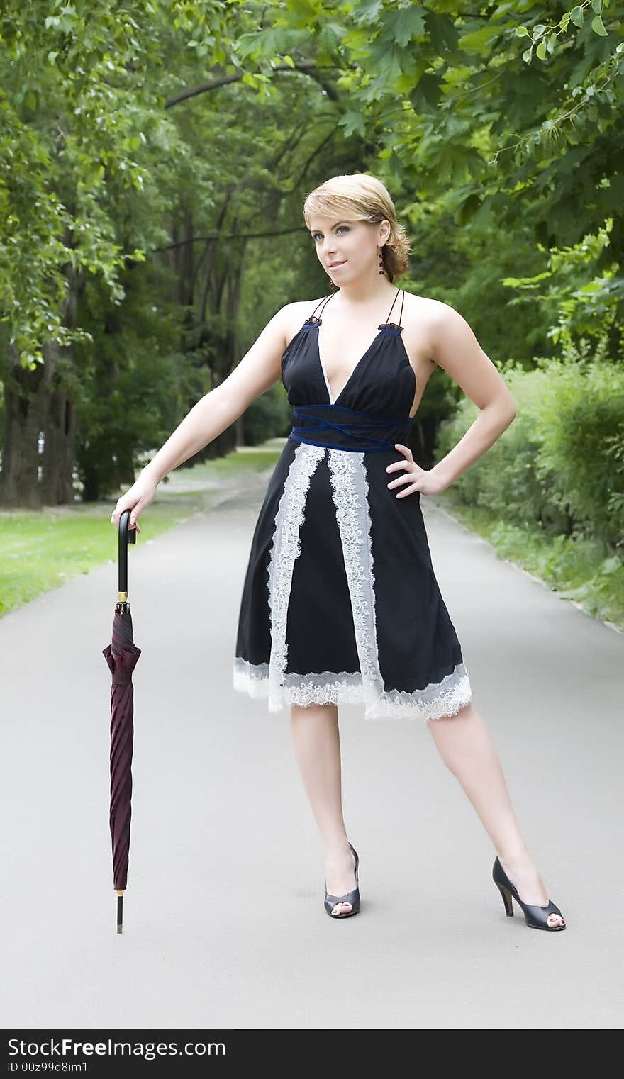 Woman Standing In The Park