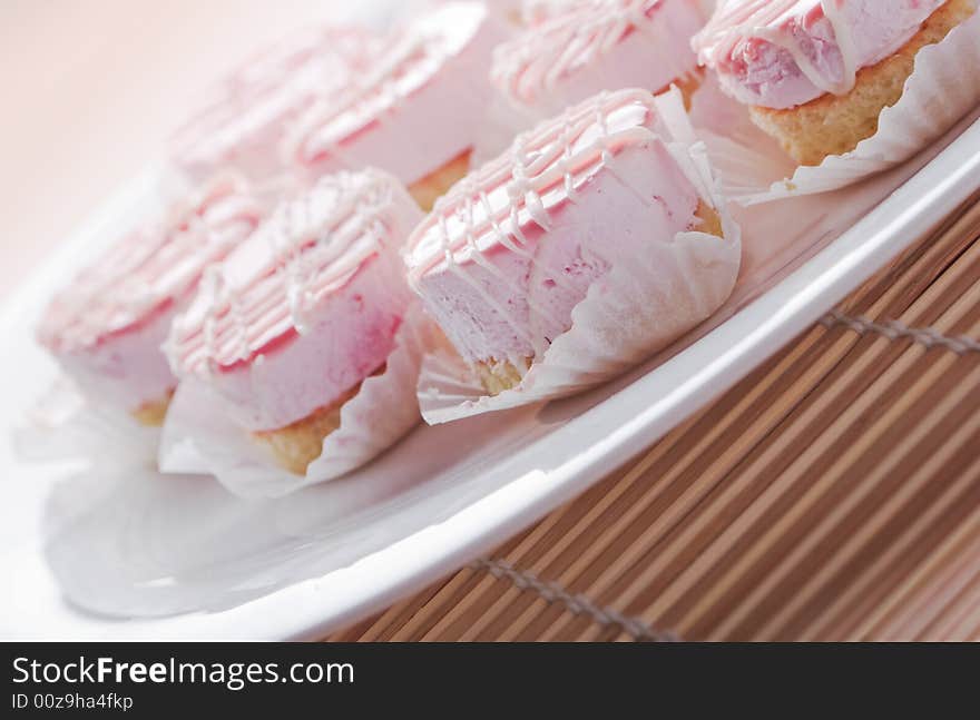 Small cakes on white plate