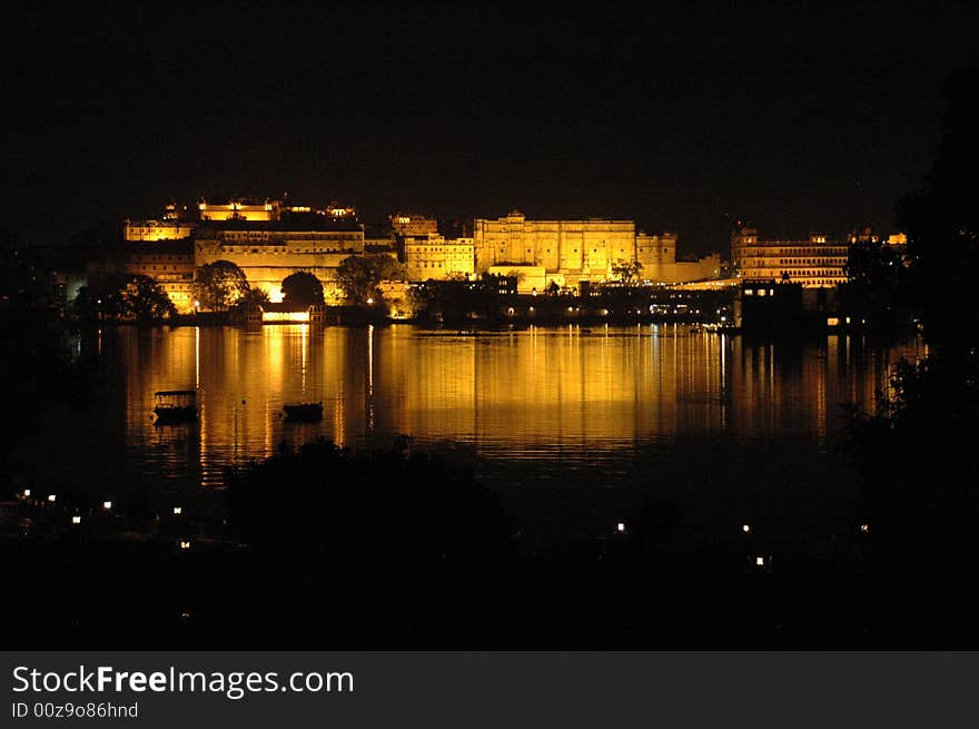 Picture of a reflection of lighted building on a lake at night. Picture of a reflection of lighted building on a lake at night