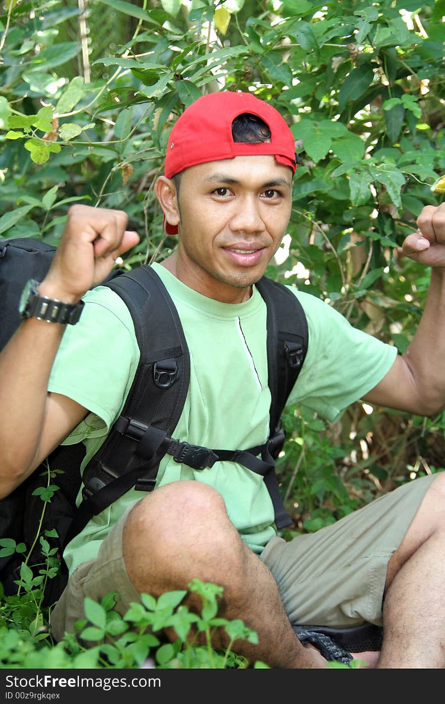 Hiking backpacker in the forest