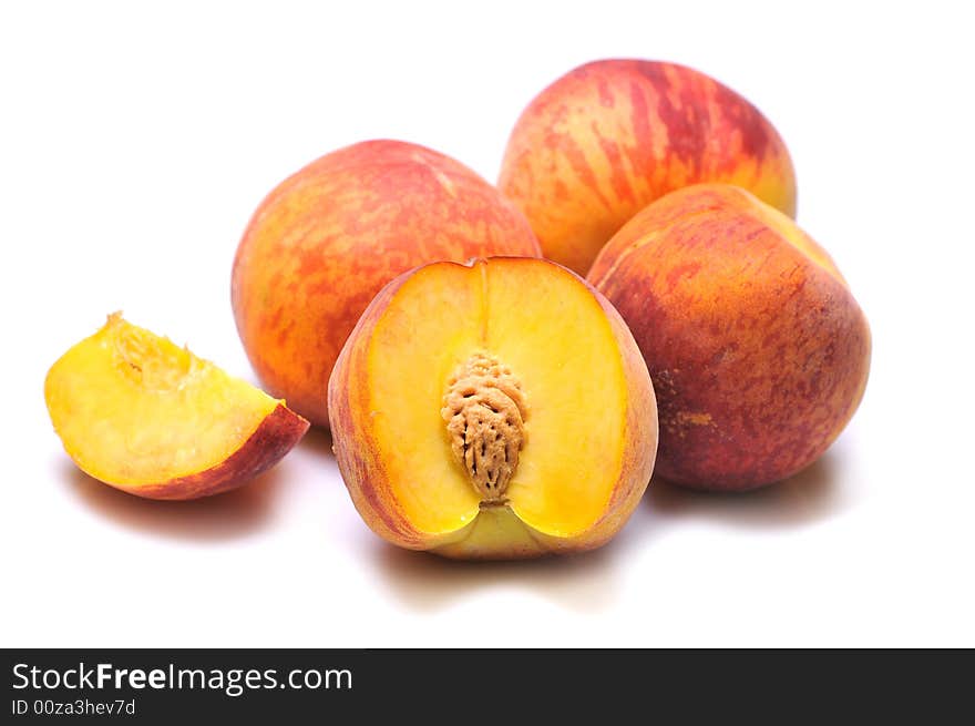 Fresh peachs on white background