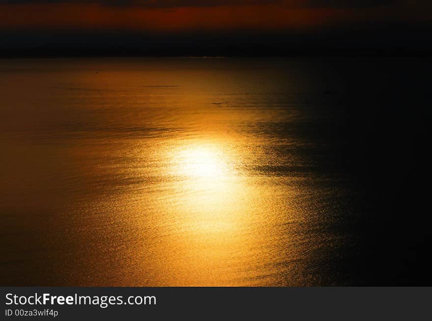 Water reflections of the evening sun. Water reflections of the evening sun