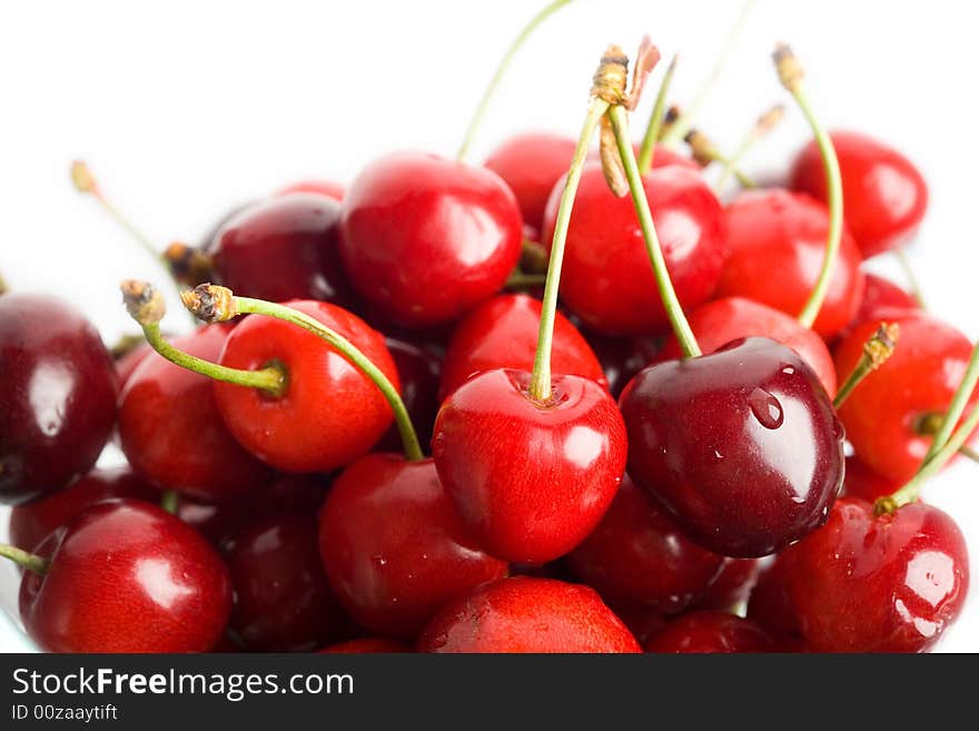 Red cherries on white background. Red cherries on white background