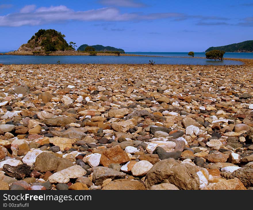 View to sea accross a pebbel beach at Whitsundays Islands. View to sea accross a pebbel beach at Whitsundays Islands.