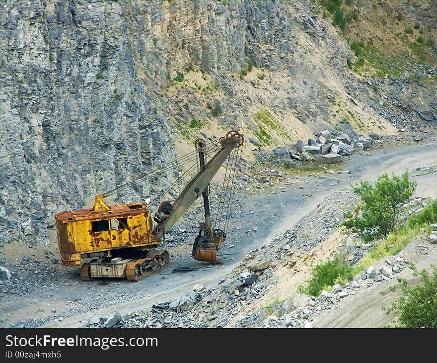 Excavator in site