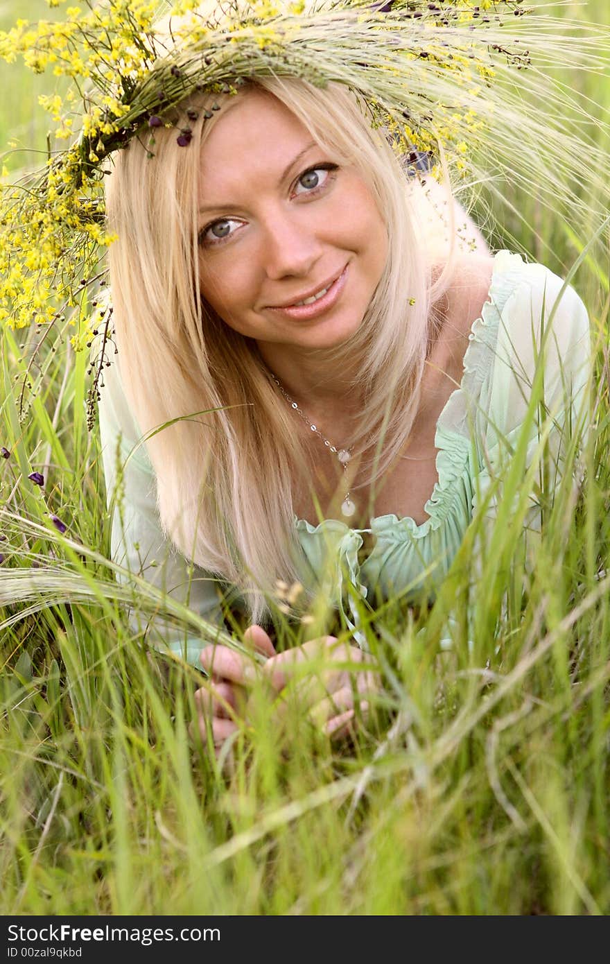 Sexy caucasian girl with flower garland