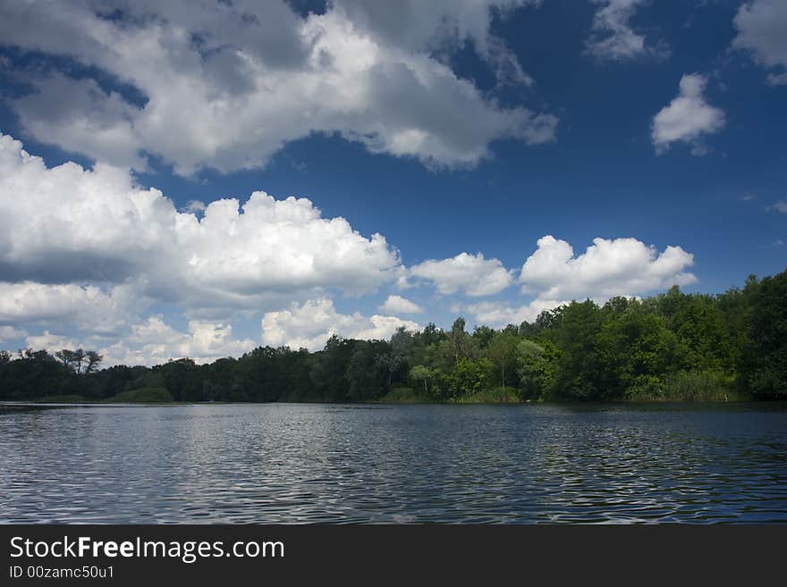 Beautiful landscape with river and clouds