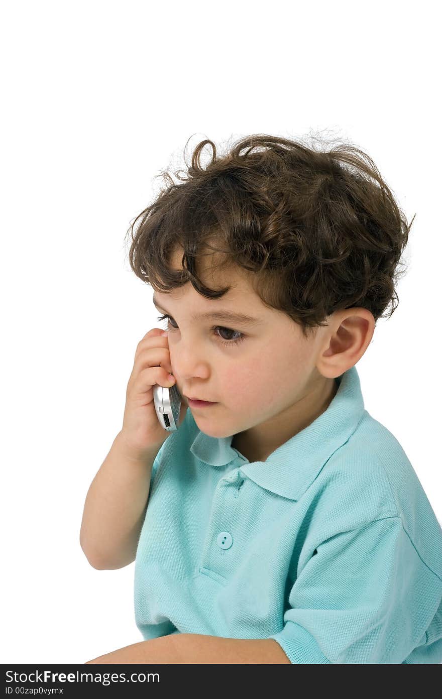 Young boy talking on the phone