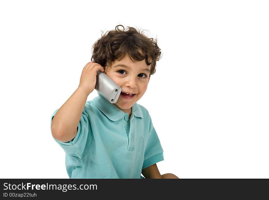 Young boy talking on the phone isolated on white