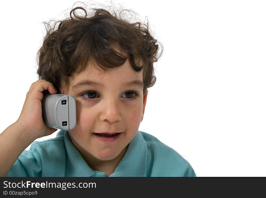 Young boy talking on the phone isolated on white