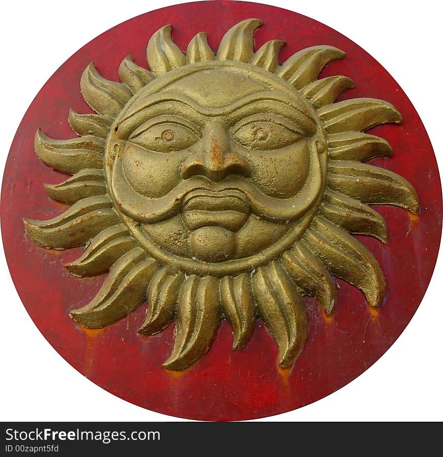 A symbol of the sun with a face on it.