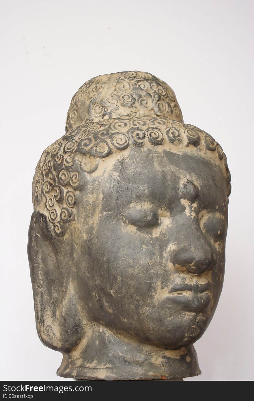 Head of Buddha showing calm and serenity