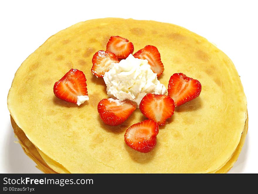 Pancakes filled with whipped cream cheese and strawberry. Pancakes filled with whipped cream cheese and strawberry