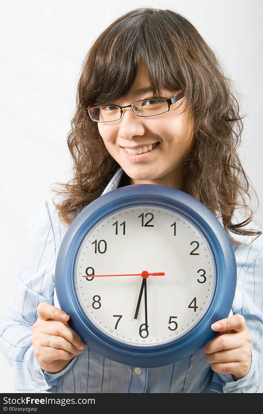 Half past six is the time to ring out which makes a young office lady very happy. Half past six is the time to ring out which makes a young office lady very happy