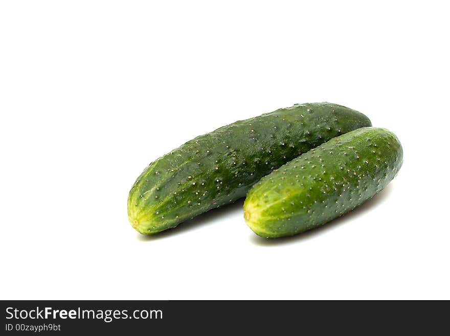 Cucumbers on a white