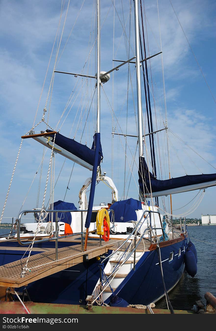 Luxury sea yacht near pier