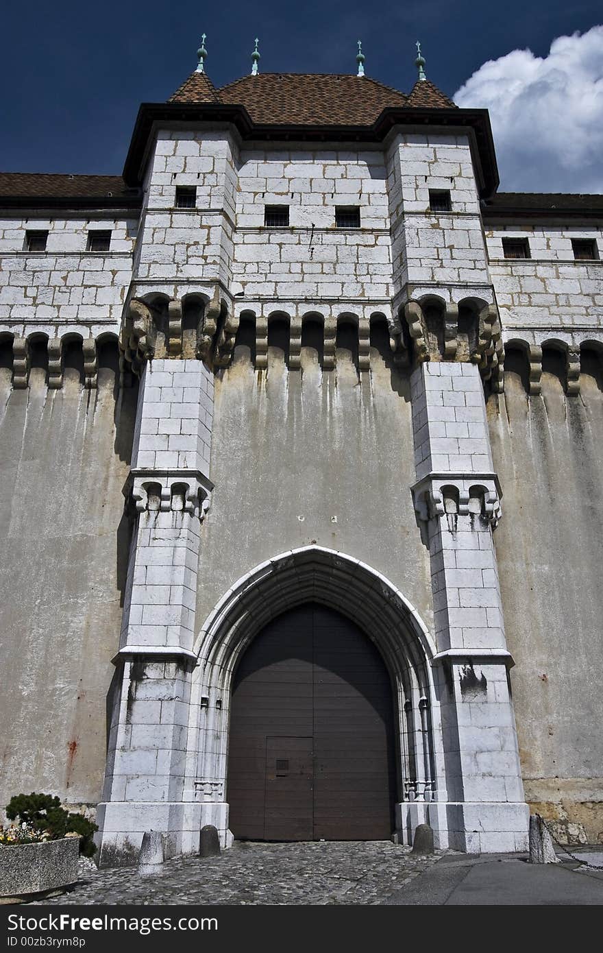 Wide angle view of a castle entrance in France. Wide angle view of a castle entrance in France.