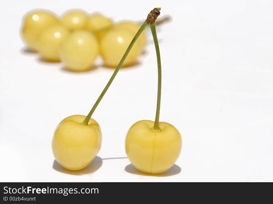 Pair to ripe yellow sweet cherries