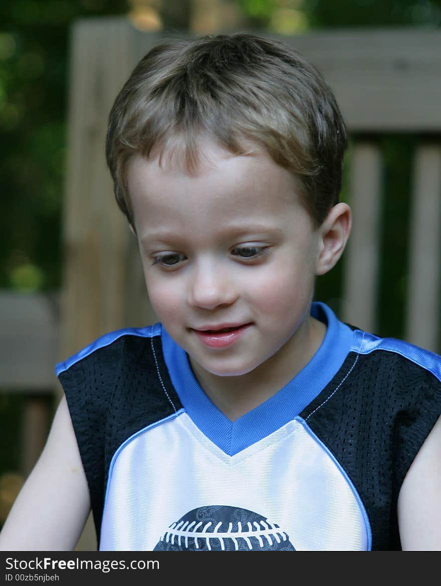 Portrait of a boy playing outside