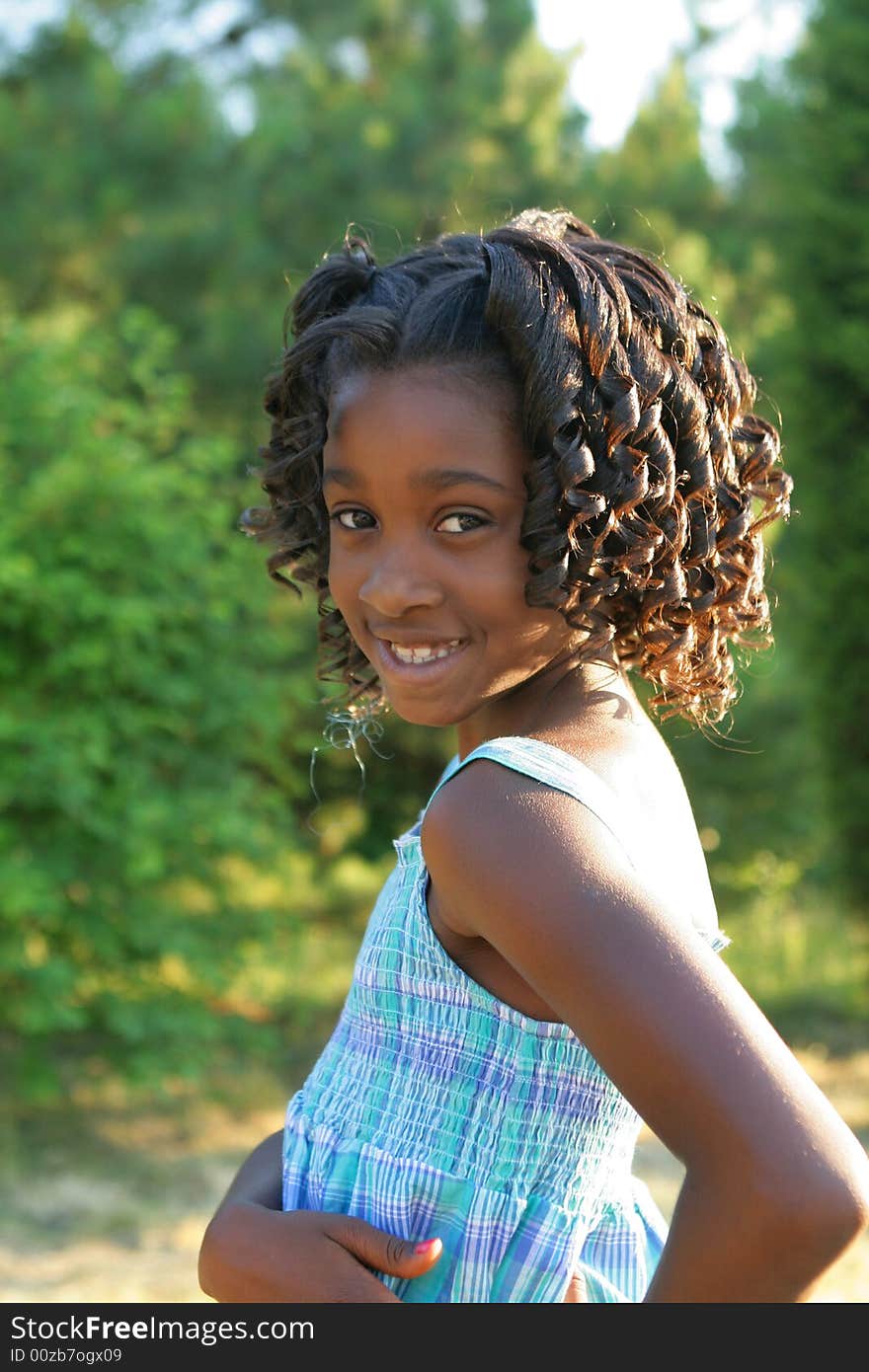 A beautiful african american child enjoying the outdoors. A beautiful african american child enjoying the outdoors