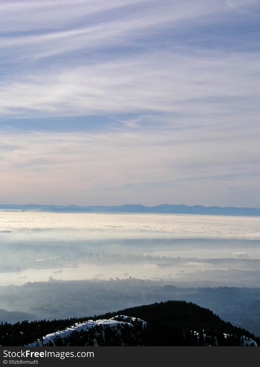 View from north shore mountains on the city of vancouver in the fog