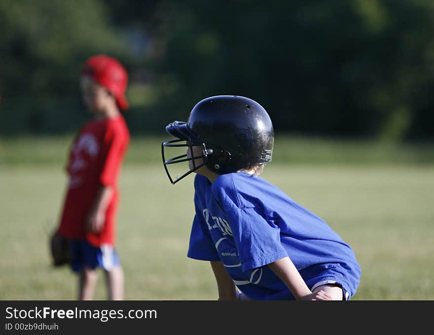 Young boy playing little league. Young boy playing little league