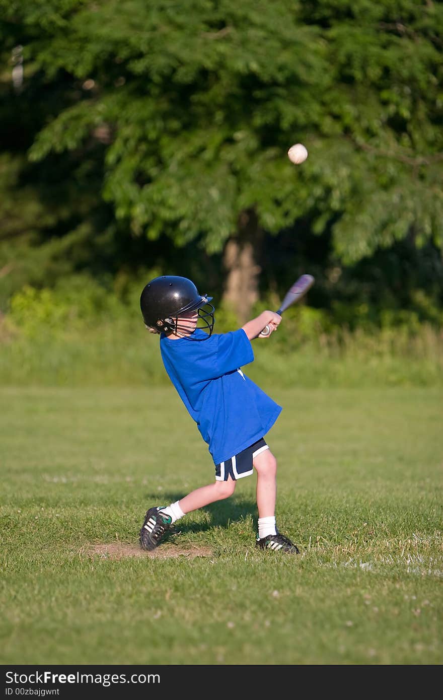 Young boy playing little league. Young boy playing little league