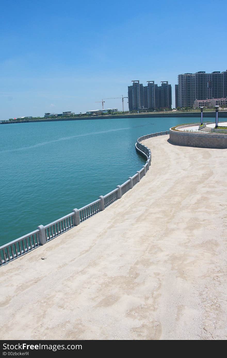 Coast with White railing and sand. Coast with White railing and sand