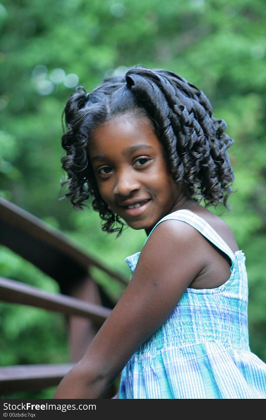 A beautiful african american child enjoying the outdoors. A beautiful african american child enjoying the outdoors