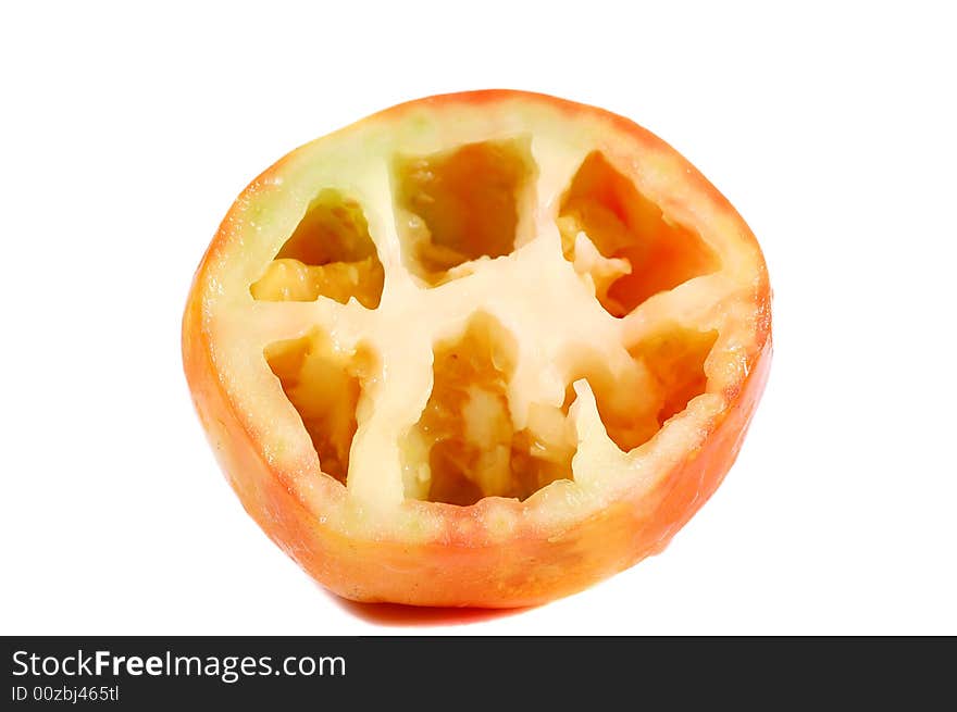 Tomato cut in half isolated on a white background. Tomato cut in half isolated on a white background