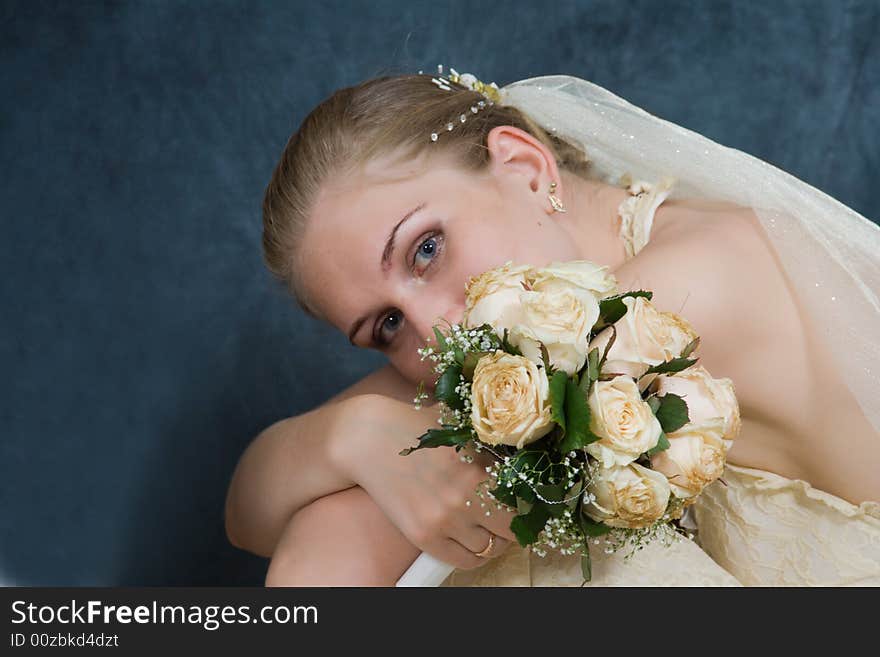 Wedding portrait of the bride, on a dark background