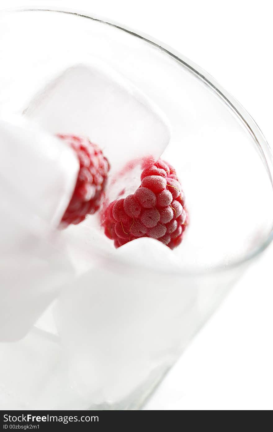 Frozen raspberries with ice