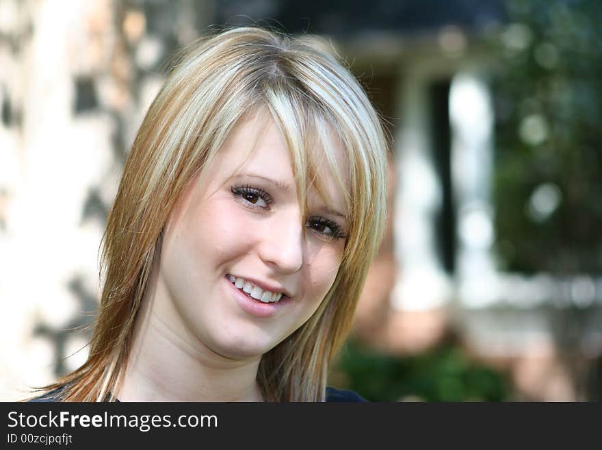 Beautiful woman standing and looking at camera