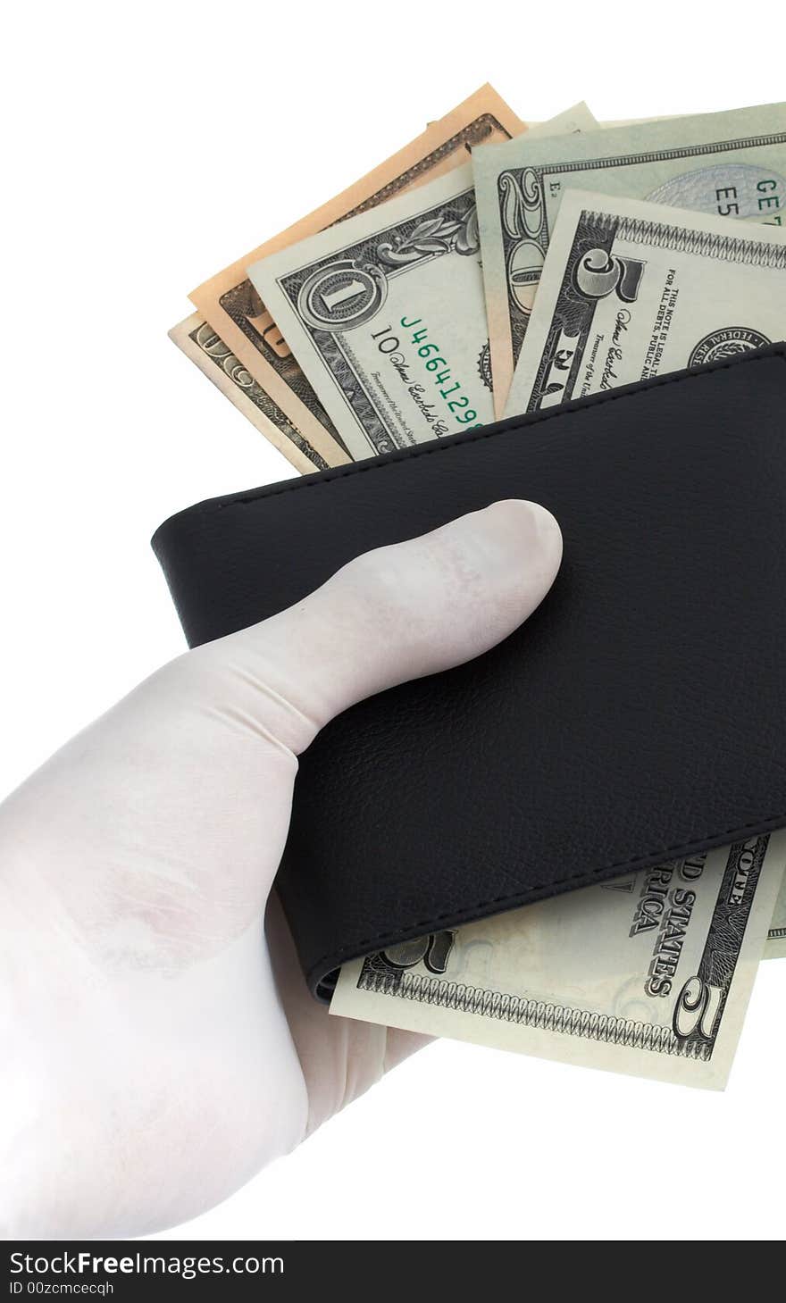 A hand holding a wallet with some dollar bills