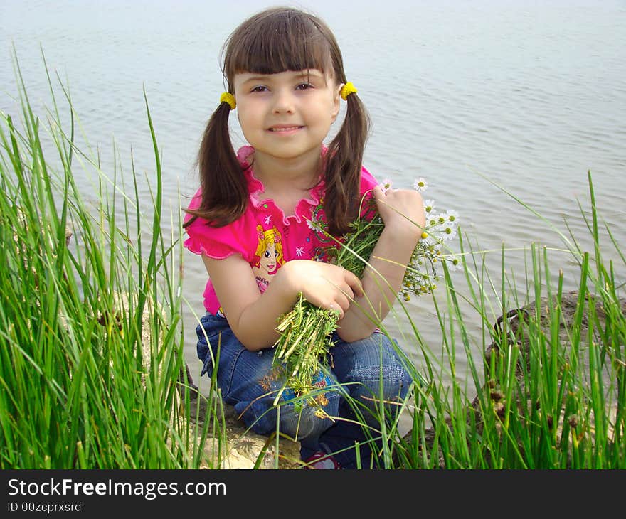 Portrait of girl with a bouquet.