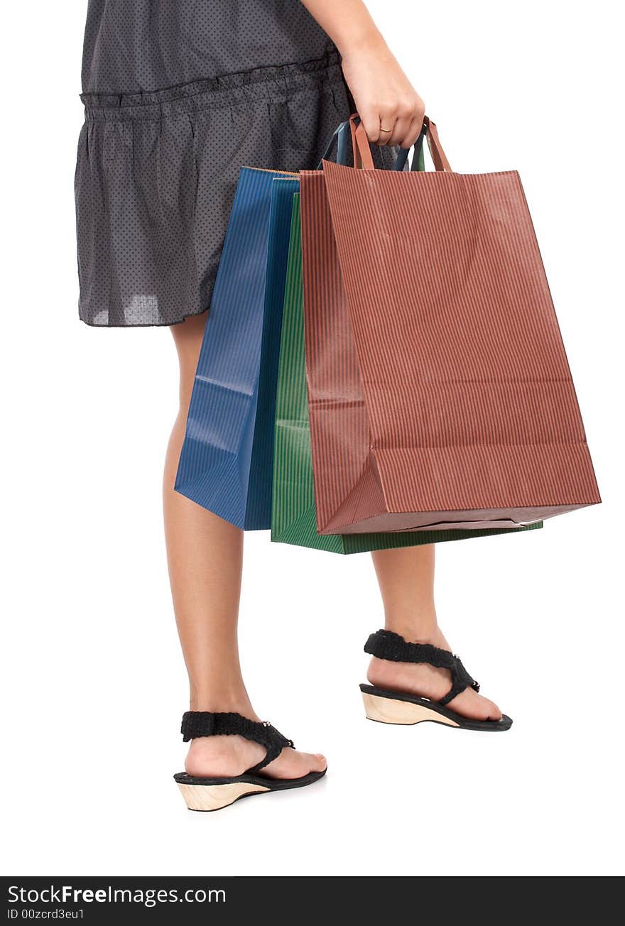 Shopping bags carried by a young female