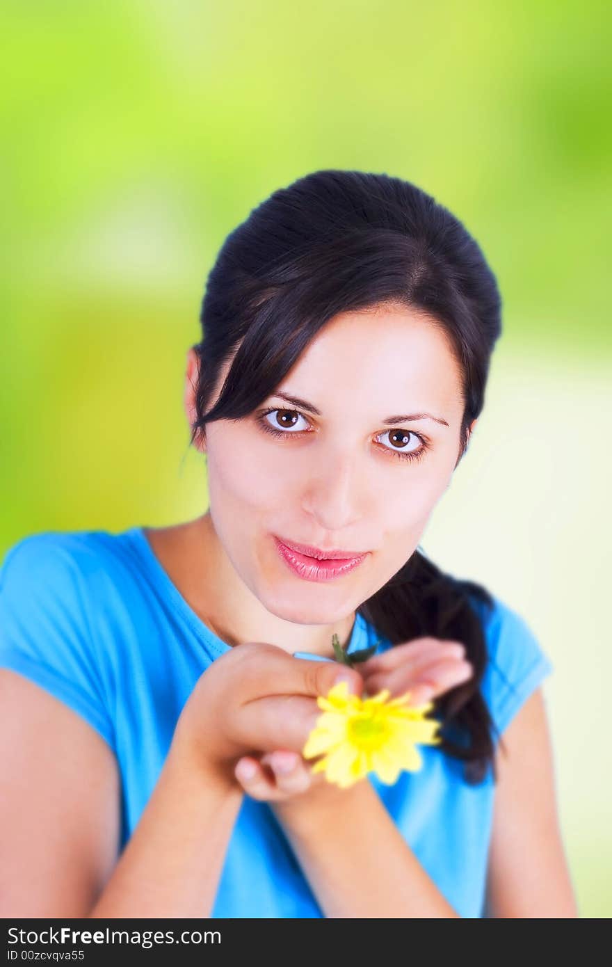 Woman and yellow flower