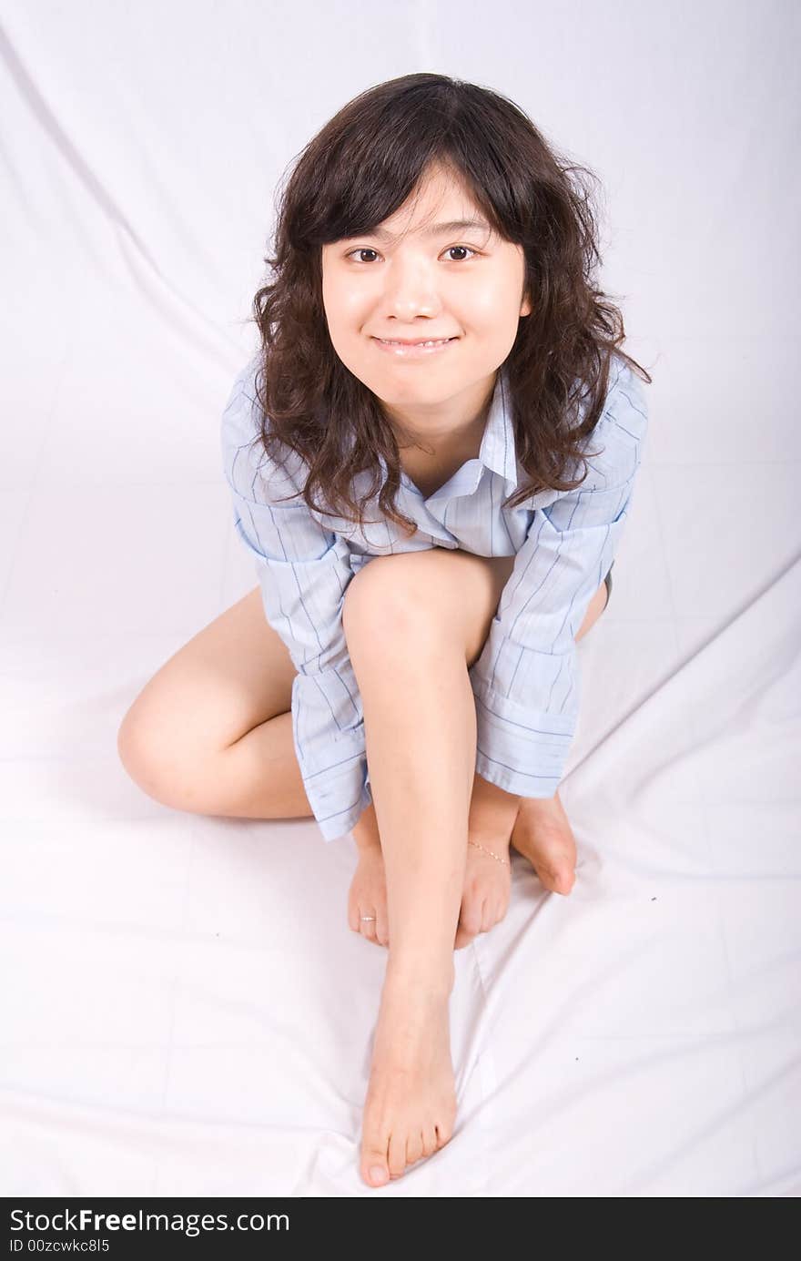 A young asian belle with knickers and light blue shirt. A young asian belle with knickers and light blue shirt