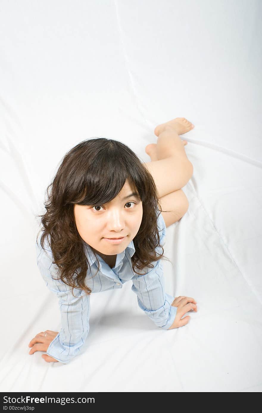 A young asian belle with knickers and light blue shirt