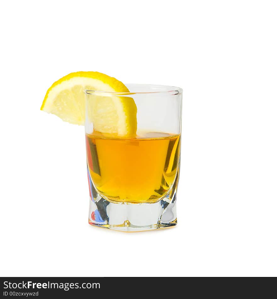 Drink and a slice of fresh lemon isolated on white background. Drink and a slice of fresh lemon isolated on white background.