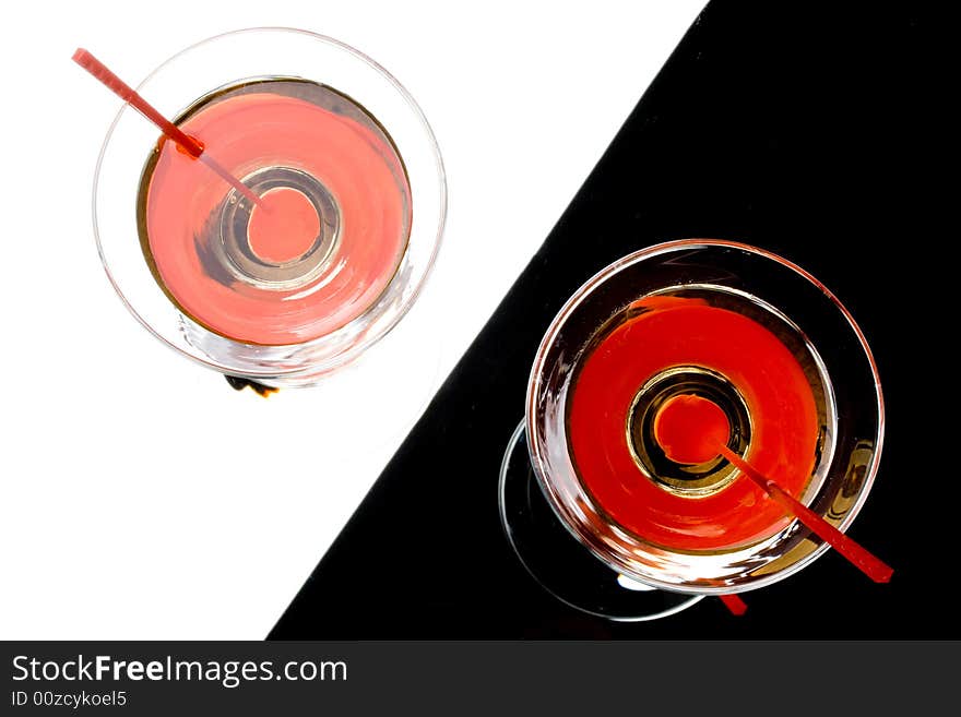 Martini with red cherry in a glass. Martini with red cherry in a glass